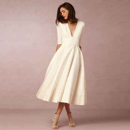 Charlotte – Elegancka sukienka z dekoltem w serek